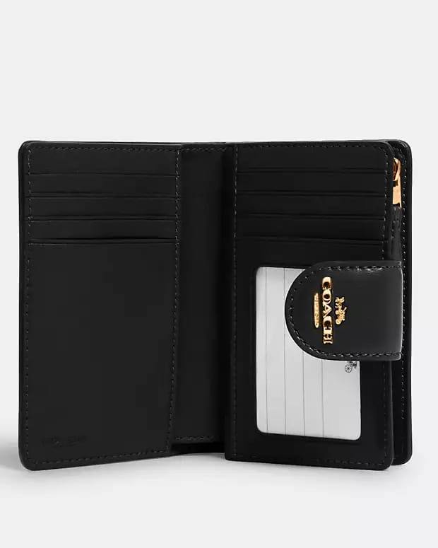 Medium Corner Zip Wallet In Signature Canvas - U Studio Official